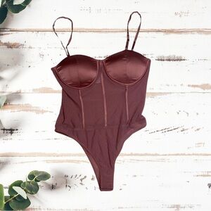 Pink Shapewear Bodysuit with Adjustable Straps and Corset Design